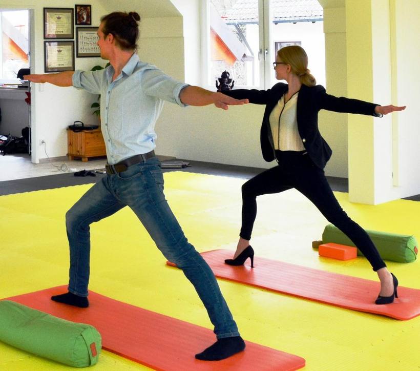 Firmenyoga in München bei TLA - Bewegung motiviert